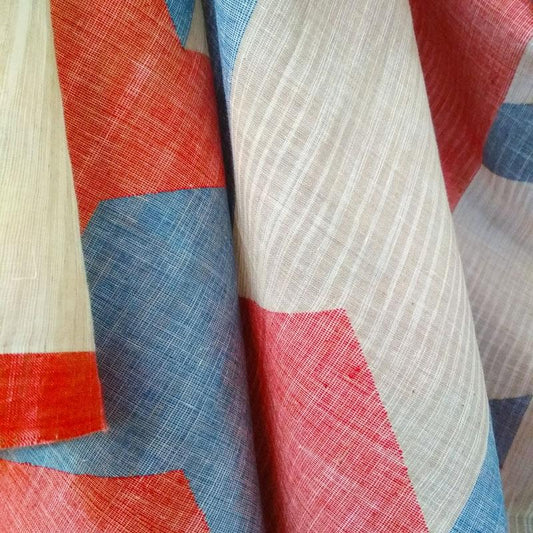 What is Khadi Exactly written with colourful khadi jamdani saree hanging in the background.