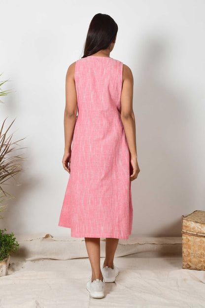 back of sleeveless pink cotton summer dress worn by an Indian female model.
